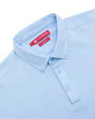 Manchester Performance Playera Polo Slim Fit color cielo para hombre