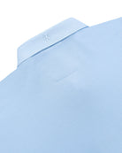 Manchester Performance Playera Polo Slim Fit color cielo para hombre