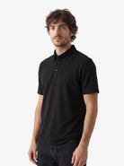 Manchester Performance Playera Polo Slim Fit color negro para hombre
