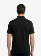 Manchester Performance Playera Polo color negro para hombre