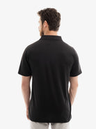 Manchester Playera Tipo Polo Lisa Poliéster y Algodón color negro para hombre